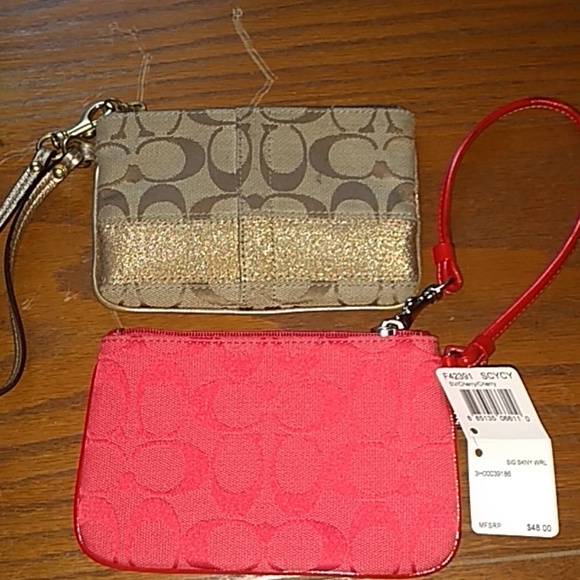 Coach Handbags - Bundle of 2 Coach wristlets.